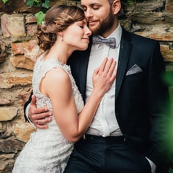 Couple And A Brick Wall