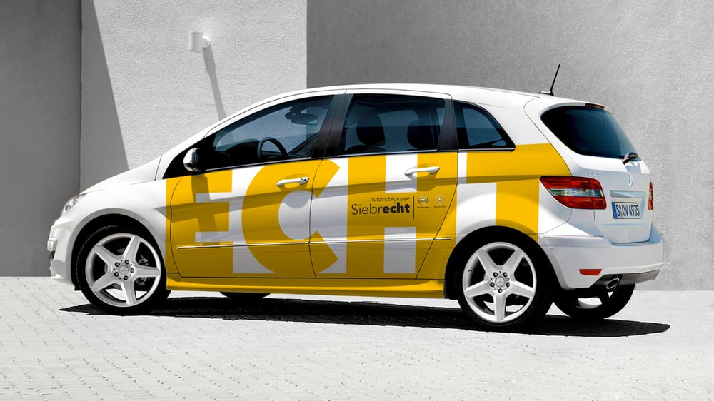 Siebrecht-fahrzeug-gestaltung-Echt-Design-orange-cube-Werbeagentur-kassel-16zu9.jpg