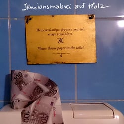 Please throw paper in the toilet (englisch und griechisch)