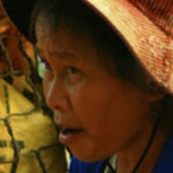 vietnamese woman with a chicken