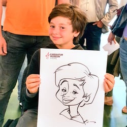 Live-Karikatur auf Papier