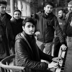 Portrait of writer Hovhannes Hovakimyan with other writer friends
