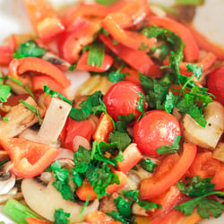 Fresh vegan fried vegetables in the pan.