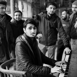 Portrait of writer Hovhannes Hovakimyan with other writer friends