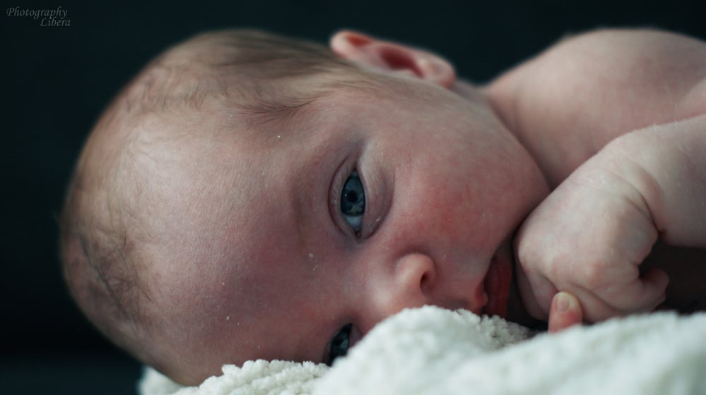 E.