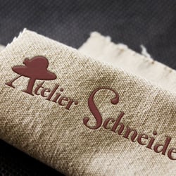 Logo für eine Hutschneiderin