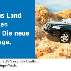 Aral SuperWash Plakate am POS