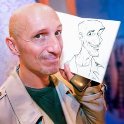 Live-Karikatur auf Papier