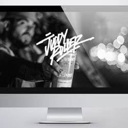 Frontpage of website displayed on iMac