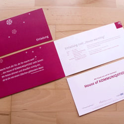 Gestaltung einer Einladungskarte für ein Event bei KOMMUNIQATIONZ GmbH