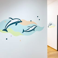 Wandgestaltung für das Kinderschutzzentrum Delfi in Klagenfurt