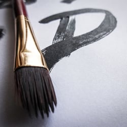 Hand painted letters.