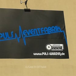 Werbeschild für Puls Wurzen