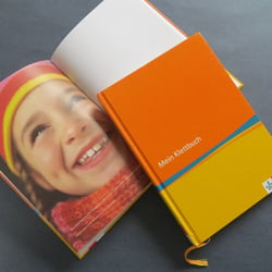 Mitarbeiterbuch zur Einführung des neuen Corporate Designs, Titel
