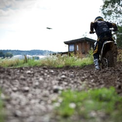 Motorcross rider practising in the Bavarian countryside.
