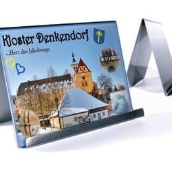Postkarte in Werbefläche eingesetzt
