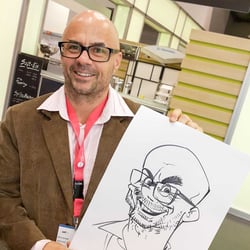Live-Karikatur auf Papier