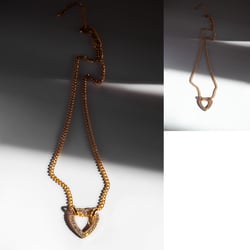Goldkette mit Herzanhänger | Dramatische Lichtretusche