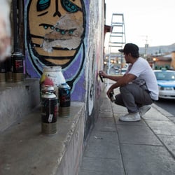 Streetartist Yescka at work/ Oaxaca, Mexico 2013