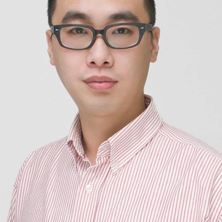 Yigang Wang