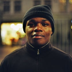 PORTRAIT SURROUNDED BY CITY LIGHTS