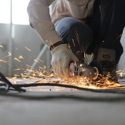 person-holding-grinder