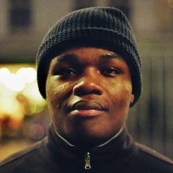 PORTRAIT SURROUNDED BY CITY LIGHTS