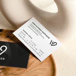 Umsetzung Werner Optik | Visitenkarten mit Lackveredelung