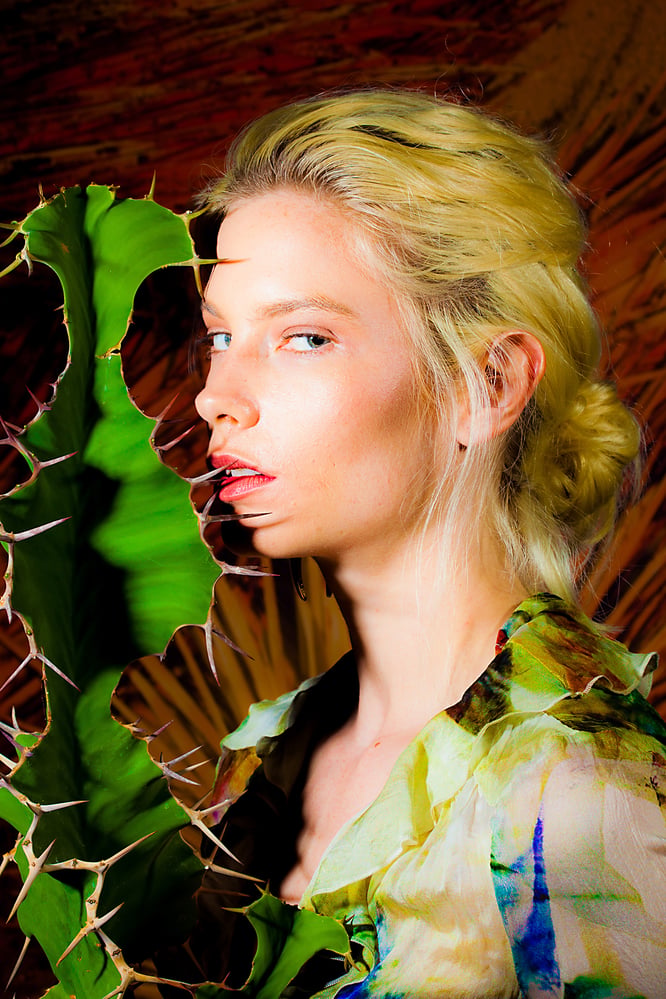 J – a blonde woman