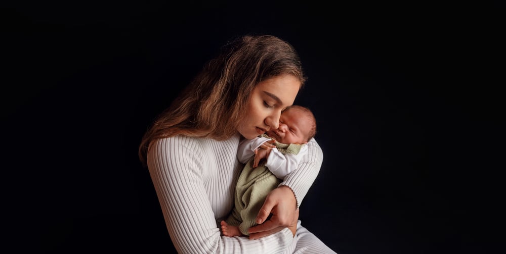Mama mit Newborn