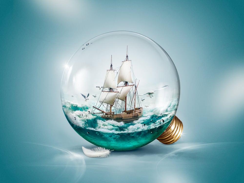 Sailing boat in a light bulb