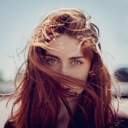 J.