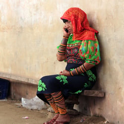 kuna woman with cell phone