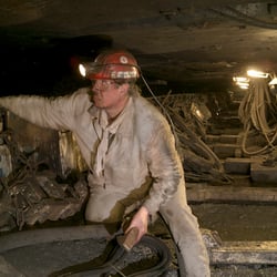 Bergwerk Ost: Bergmann im Flöz Schacht Heinrich, 7. Sohle (- 1120m)