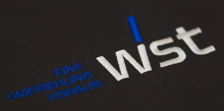 Logo nach Überarbeitung (auf Jacke für Mitarbeiter)