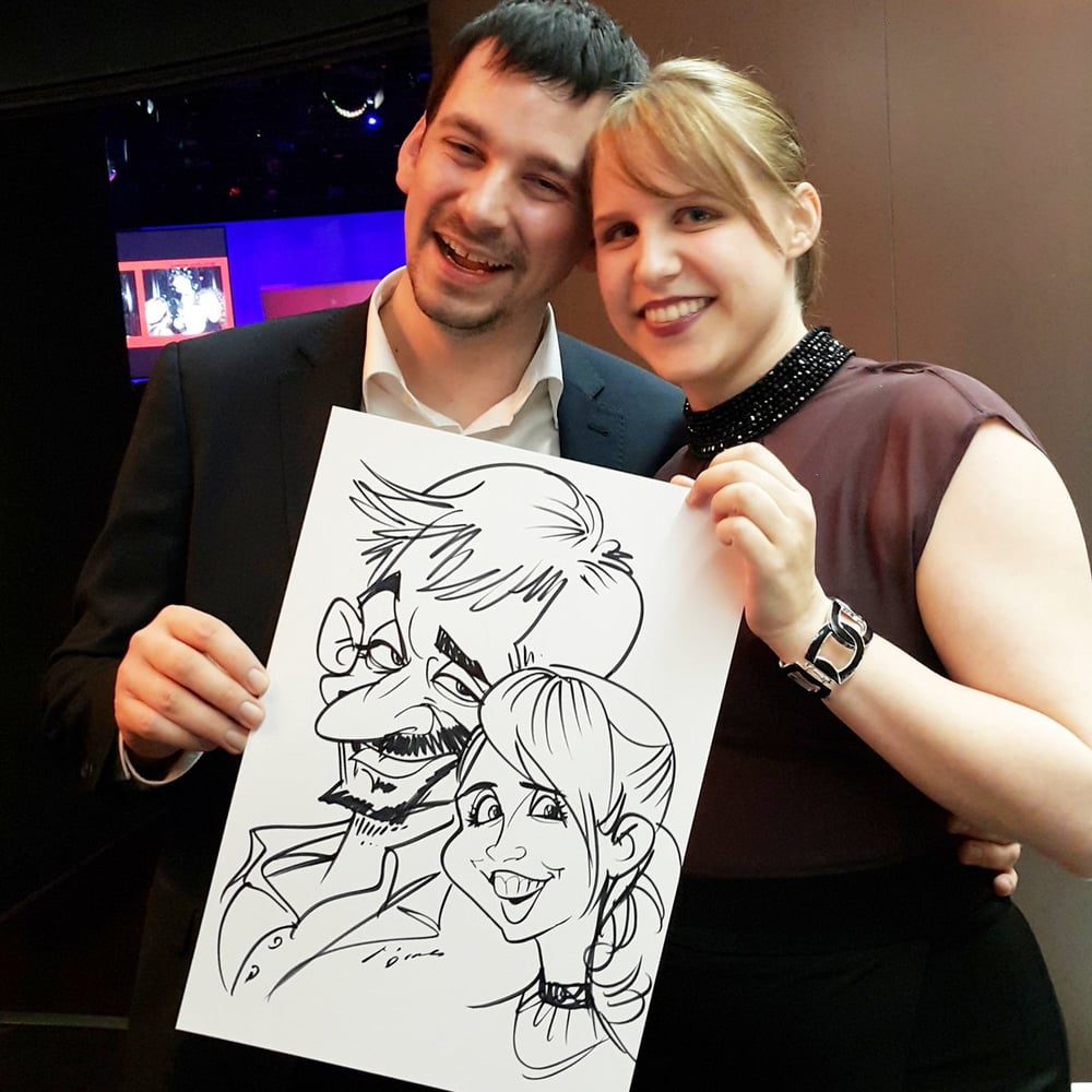 Live-Karikatur auf Papier